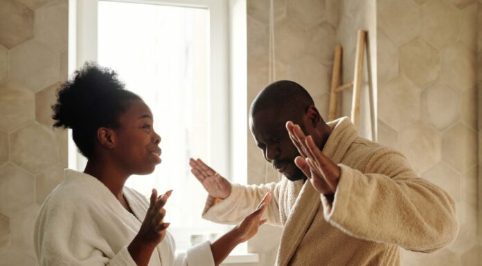 Couple discussing their morning bathroom and hot water routine