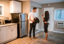 When Your Partner Never Refills the Water Pitcher: How to Fix the Kitchen Routine Without Nagging Couple discussing their shared water pitcher routine in the kitchen