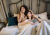 When Your Partner Keeps Taking Your Phone Charger: How to Share Cables Without Fighting Couple using smartphones together while discussing their charging routine
