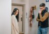 Couple addressing leaves laundry in the washer