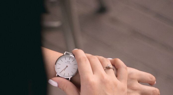 Woman checking the time on her wristwatch