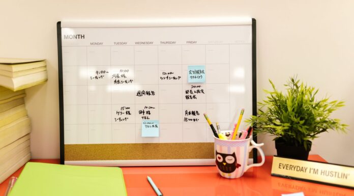 Couples Therapy Cancellation Policies: What to Ask About Fees and Missed Sessions Desk calendar with notes beside stationery and a plant on a red desk