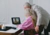 Older couple using a laptop for a video call at home