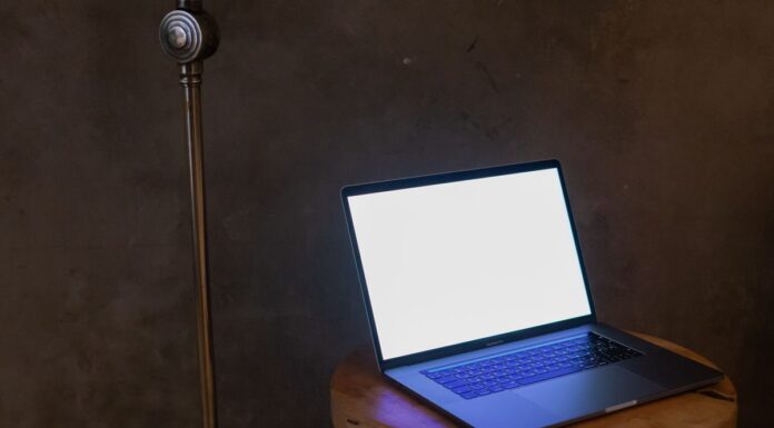 When Your Couples Therapist Asks for an Online Review: Privacy and Boundaries Laptop with a blank screen on a wooden table