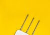 When Online Couples Therapy Disconnects: Make a Backup Plan White Wi-Fi router with antennas and cables on a yellow background