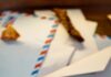 When Your Partner Opens Your Mail: Setting a Privacy Boundary Envelopes arranged beside a compass and autumn leaves on a table